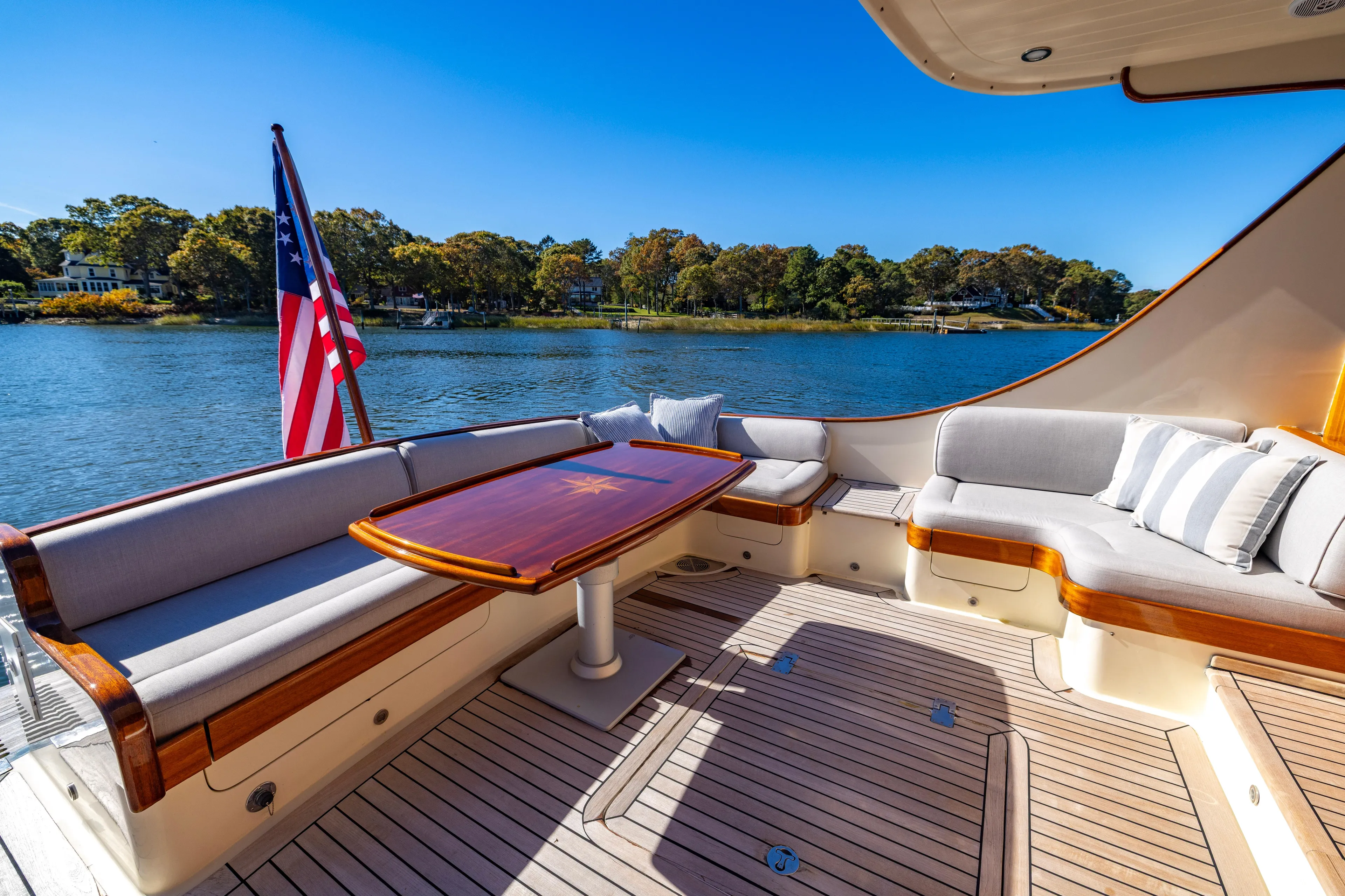Holly Ann Yacht Photos Pics Luxurious 2010 Vicem 64 Classic yacht deck with elegant seating and scenic water view.