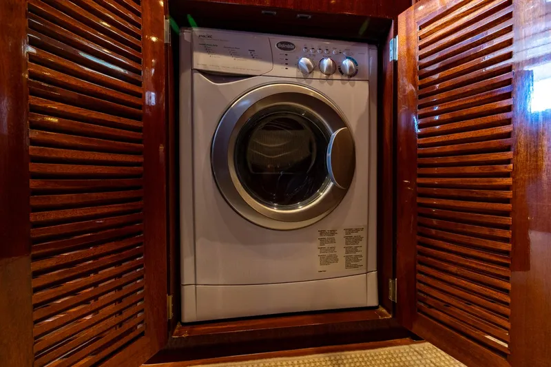 Holly Ann Yacht Photos Pics Washing machine inside Vicem 64 Classic yacht's wooden cabinet, 2010 model.