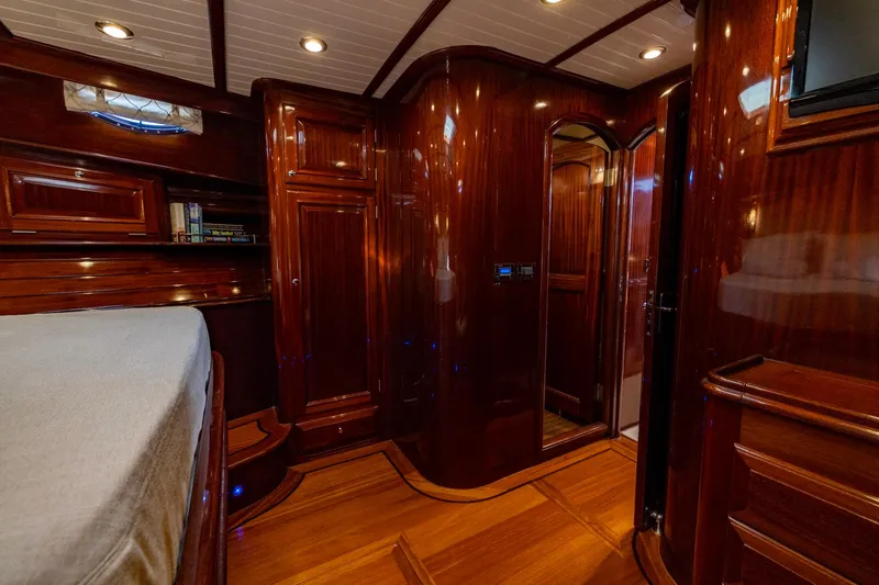 Holly Ann Yacht Photos Pics Luxurious wood interior of 2010 Vicem 64 Classic yacht cabin.