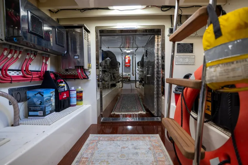 Holly Ann Yacht Photos Pics Engine room of 2010 Vicem 64 Classic yacht with equipment and safety gear.