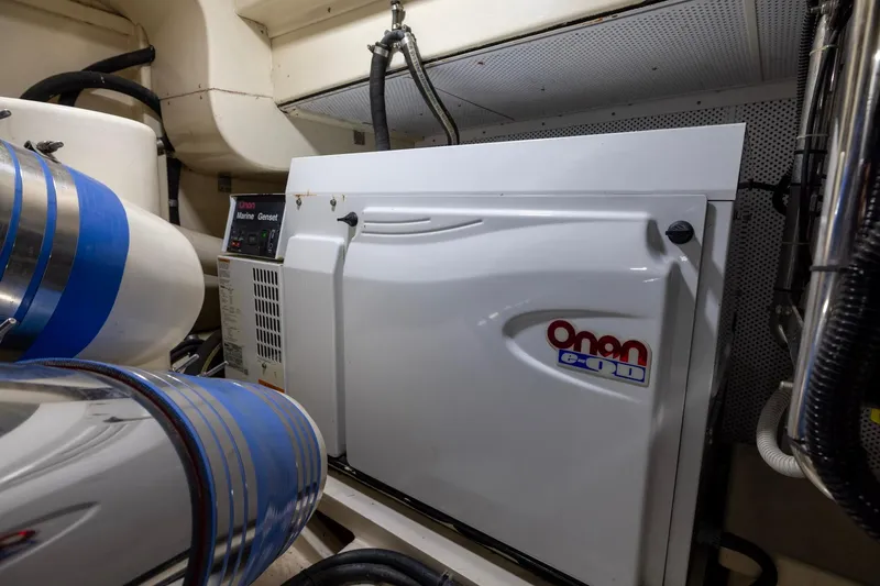 Holly Ann Yacht Photos Pics Engine room of 2010 Vicem 64 Classic with Onan marine generator.