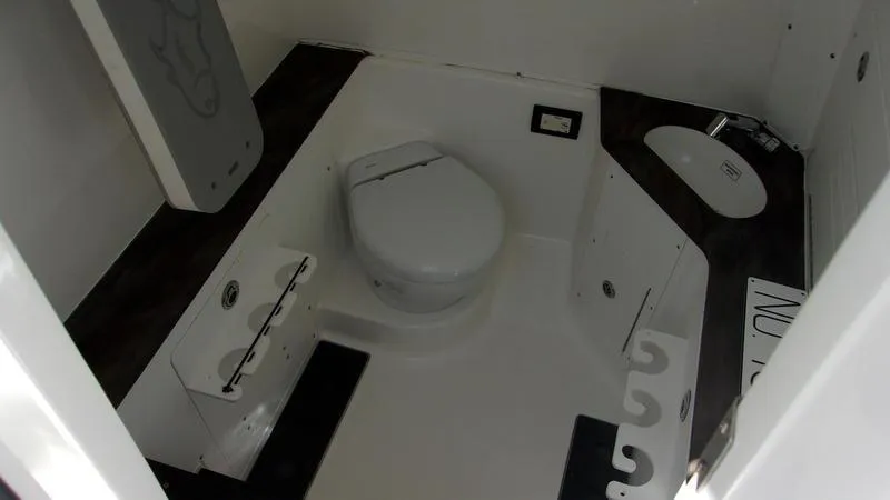  Yacht Photos Pics 2022 Crevalle 33 CSF Offshore Fishing boat interior bathroom with modern amenities.