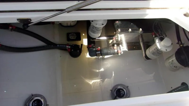  Yacht Photos Pics Crevalle 33 CSF Offshore Fishing 2022 boat interior with visible plumbing and filters.