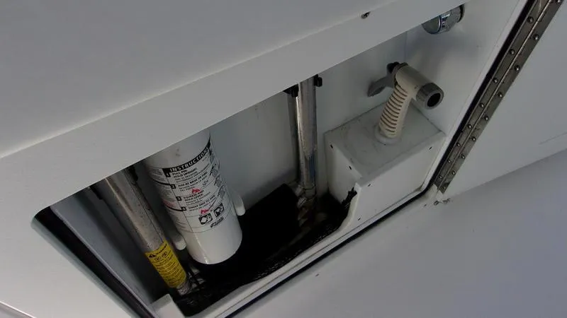  Yacht Photos Pics 2022 Crevalle 33 CSF Offshore Fishing boat interior compartment with equipment and wiring.