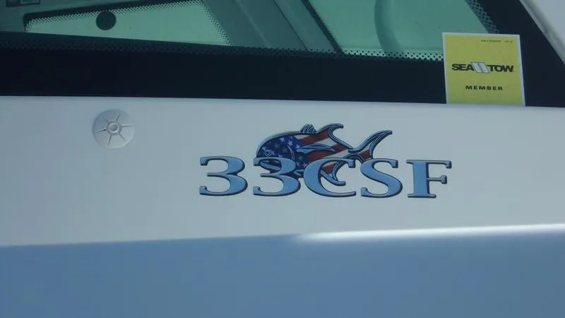  Yacht Photos Pics Crevalle 33 CSF Offshore Fishing boat, 2022 model, with Sea Tow membership sticker.