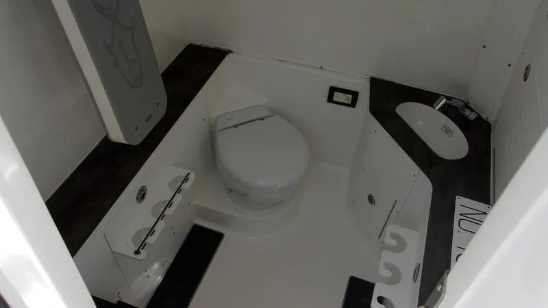  Yacht Photos Pics 2022 Crevalle 33 CSF Offshore Fishing boat interior bathroom with modern amenities.