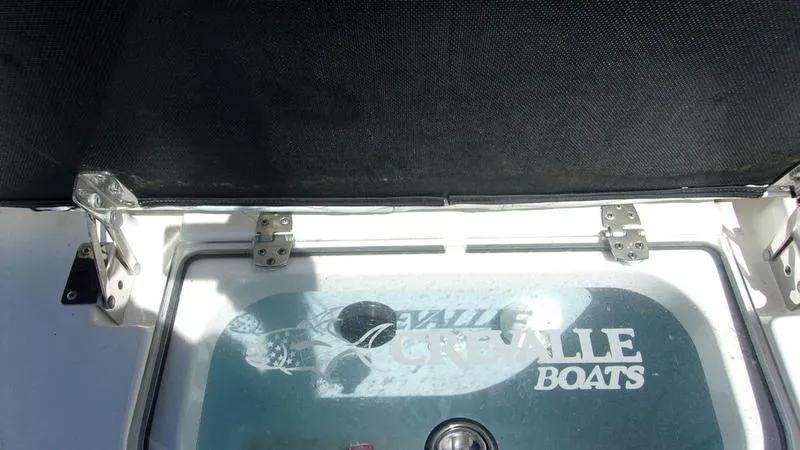  Yacht Photos Pics Crevalle 33 CSF Offshore Fishing boat hatch with logo, 2022 model.