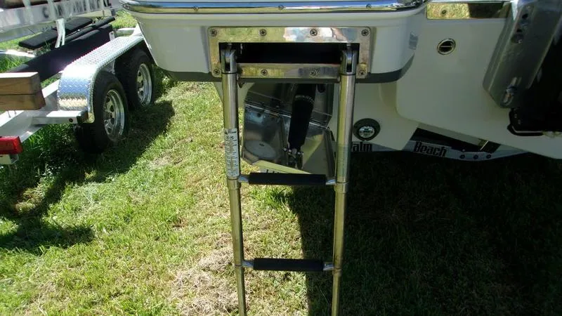  Yacht Photos Pics 2022 Crevalle 33 CSF Offshore Fishing boat ladder on grass.