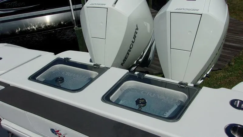  Yacht Photos Pics 2022 Crevalle 33 CSF Offshore Fishing boat with dual Mercury engines.