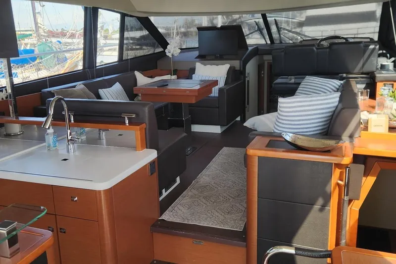  Yacht Photos Pics Luxurious interior of 2016 Jeanneau Prestige 50 yacht with modern furnishings and elegant design.