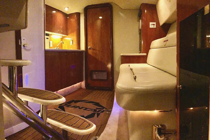  Yacht Photos Pics Luxurious interior of a 2006 Fountain 38 Express Cruiser with elegant wood finishes.