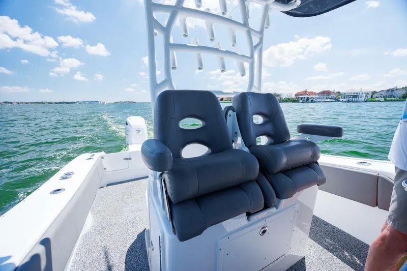  Yacht Photos Pics 2022 Cape Horn 31 T boat interior with dual seats, ocean view, and clear sky.