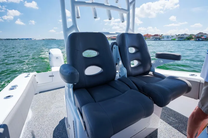  Yacht Photos Pics 2022 Cape Horn 31 T boat with dual black seats on a sunny day.