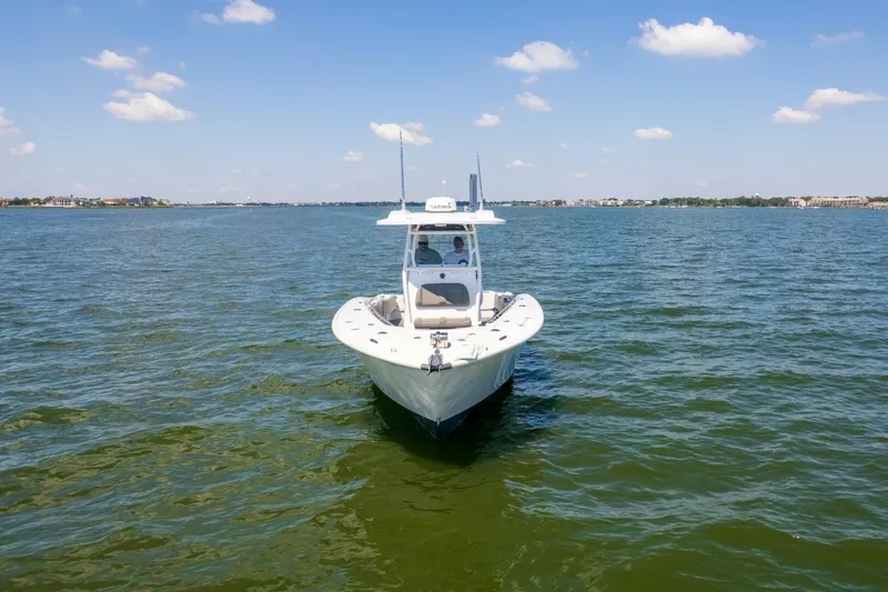  Yacht Photos Pics 2022 Cape Horn 31 T boat on open water under a clear blue sky.