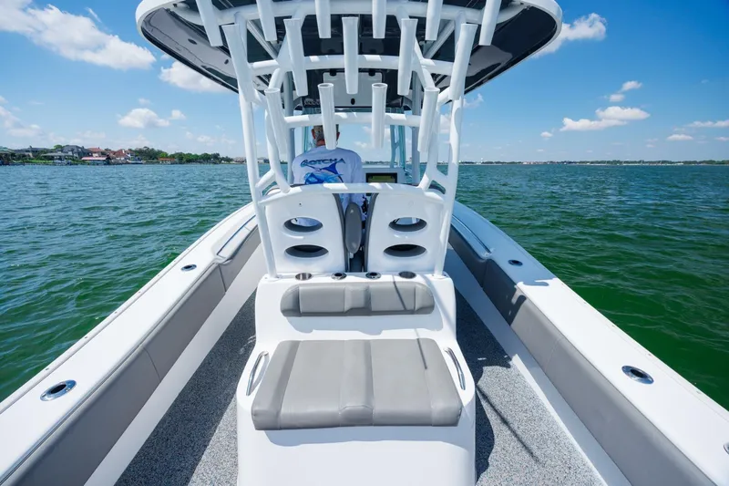  Yacht Photos Pics 2022 Cape Horn 31 T boat on water, featuring spacious deck and seating.