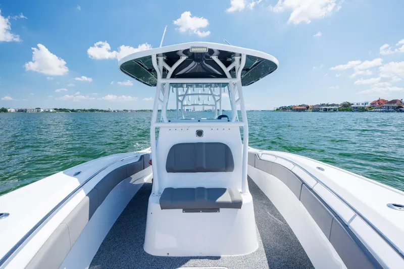  Yacht Photos Pics 2022 Cape Horn 31 T boat on water, featuring sleek design and spacious seating.