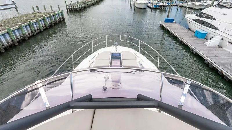  Yacht Photos Pics Prestige 460 Fly 2022 yacht docked at marina, viewed from flybridge.