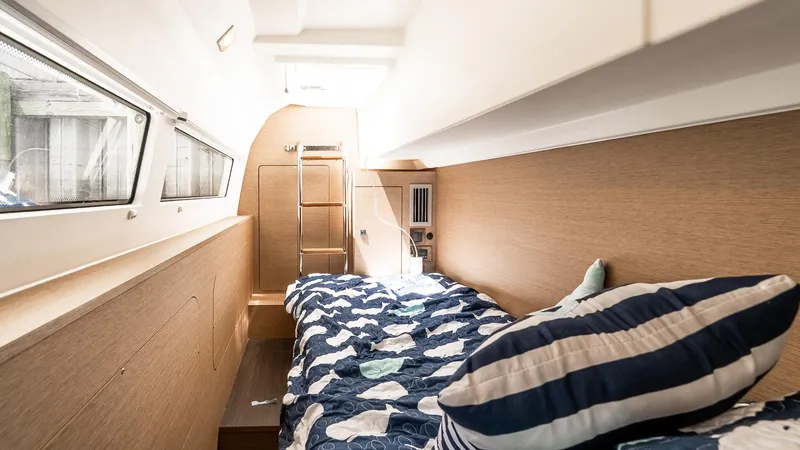  Yacht Photos Pics Interior cabin of 2022 Prestige 460 Fly yacht with cozy bedding and modern design.