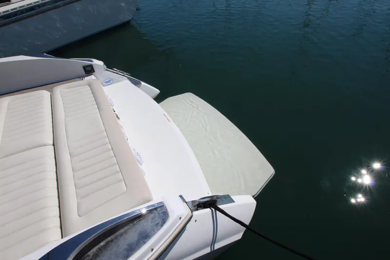  Yacht Photos Pics 2016 Cobalt R30 boat with swim platform on calm water.