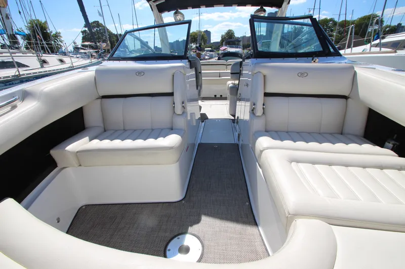  Yacht Photos Pics 2016 Cobalt R30 boat interior with white leather seating and open deck layout.