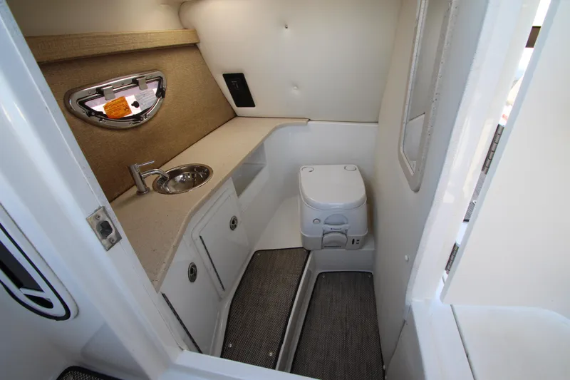  Yacht Photos Pics 2016 Cobalt R30 boat interior bathroom with sink and toilet.
