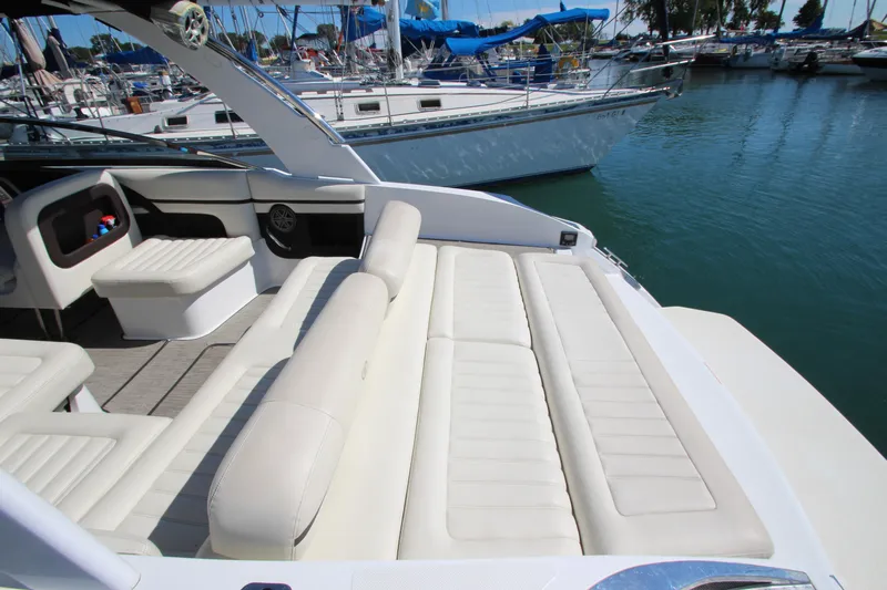  Yacht Photos Pics Luxurious 2016 Cobalt R30 boat with spacious white seating at a marina.