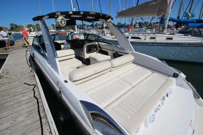  Yacht Photos Pics 2016 Cobalt R30 boat docked, featuring spacious seating and sleek design.
