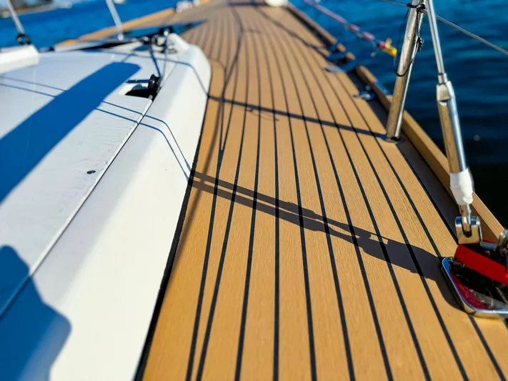 4797ak Yacht Photos Pics Close-up of 2021 Saffier 33 SE yacht deck with sleek wooden finish.