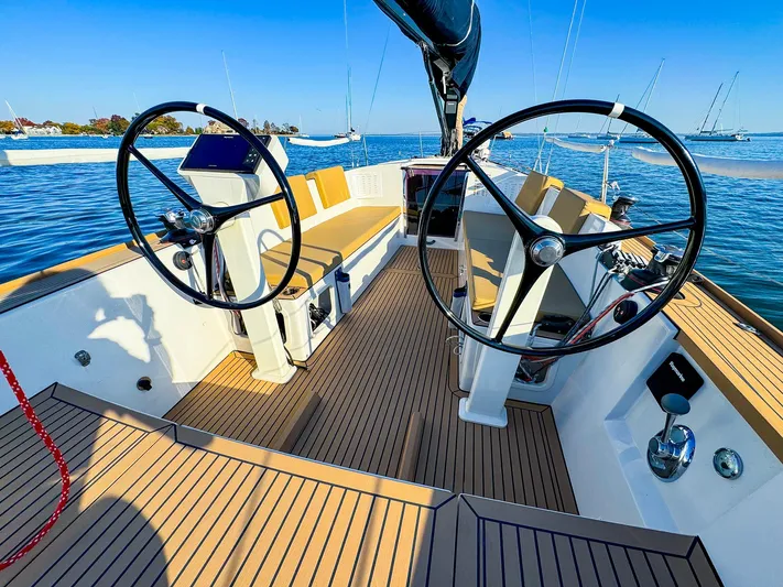 4797ak Yacht Photos Pics 2021 Saffier 33 SE sailboat cockpit with dual steering wheels on calm water.