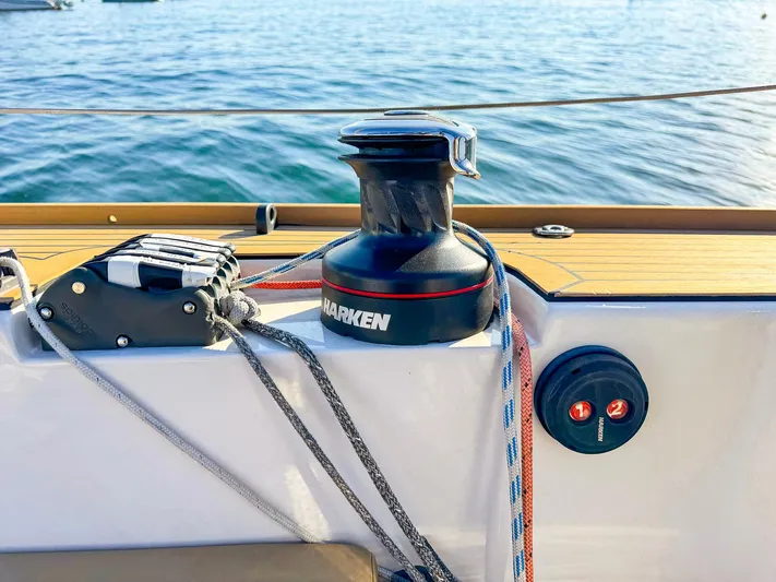 4797ak Yacht Photos Pics Saffier 33 SE sailboat deck with Harken winch, 2021 model, on calm water.