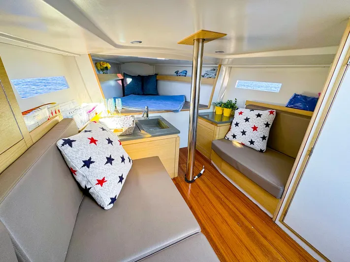 4797ak Yacht Photos Pics 2021 Saffier 33 SE yacht interior with cozy seating and nautical decor.