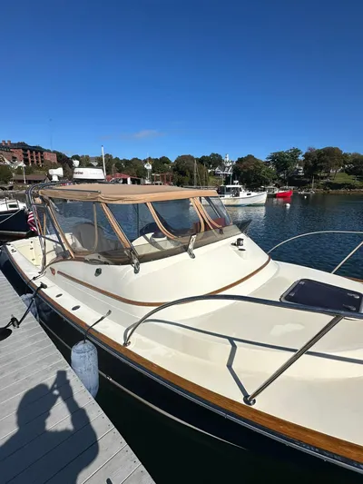 Golden Gate Yacht Photos Pics 1997 Hinckley T29 Express boat docked in a marina under clear blue skies.