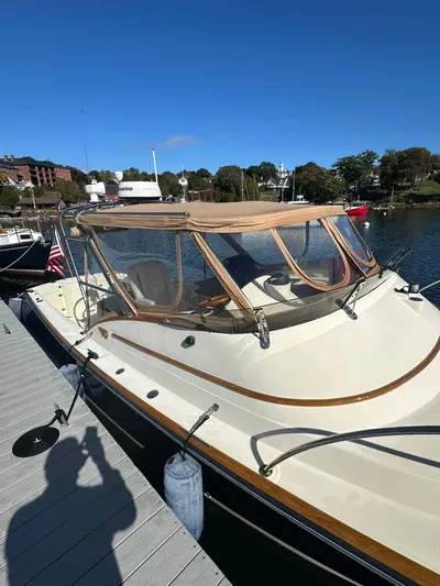 Golden Gate Yacht Photos Pics 1997 Hinckley T29 Express docked, showcasing classic design and elegant lines.