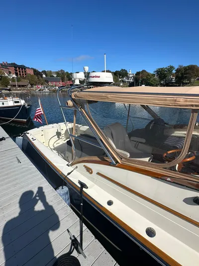 Golden Gate Yacht Photos Pics 1997 Hinckley T29 Express docked at marina under clear blue sky.
