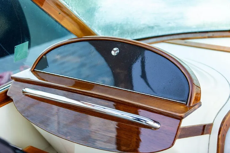 Coot Yacht Photos Pics Hinckley Talaria 29R 2005 dashboard with elegant wood and chrome detailing.