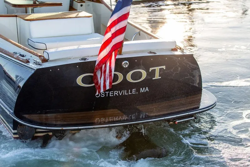 Coot Yacht Photos Pics Hinckley Talaria 29R 2005 boat with American flag, Osterville, MA.