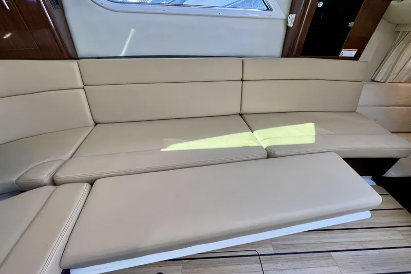  Yacht Photos Pics Beige leather seating in 2013 Regal 35 Sport Coupe interior.