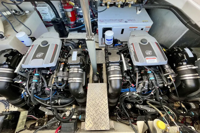  Yacht Photos Pics Engine compartment of 2013 Regal 35 Sport Coupe with dual engines and detailed components.