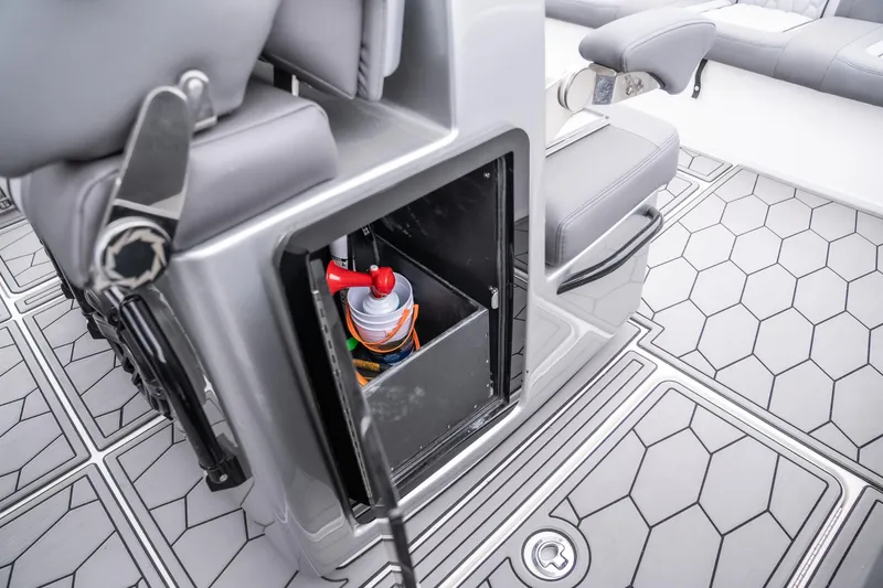  Yacht Photos Pics 2022 Fountain 38 SC boat interior storage compartment with hexagonal floor design.