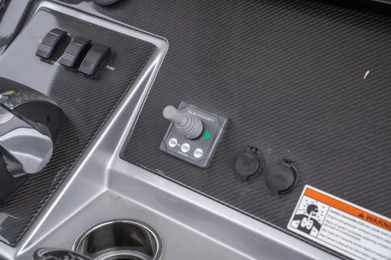  Yacht Photos Pics Control panel of 2022 Fountain 38 SC boat with joystick and switches.