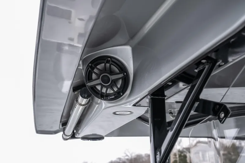  Yacht Photos Pics 2022 Fountain 38 SC boat with sleek speaker and canopy detail.