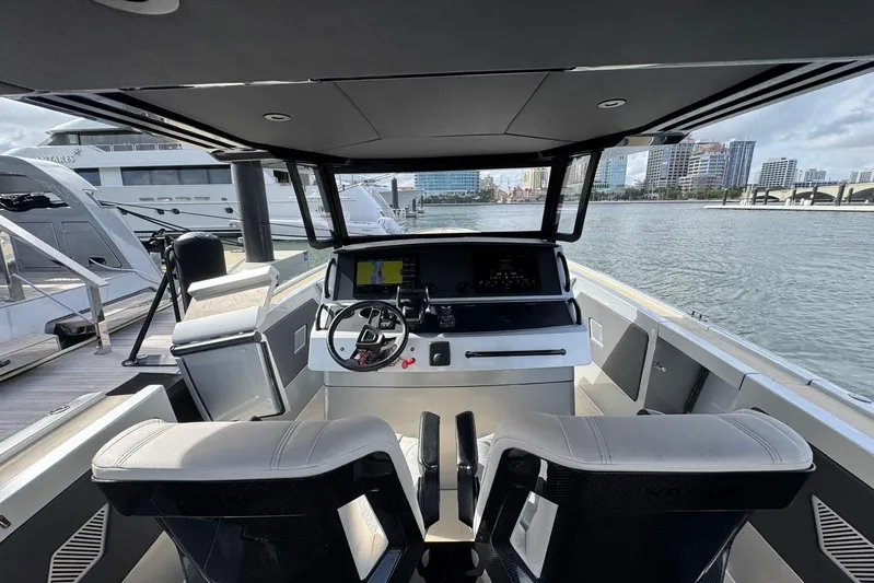 T/t Tenacious Yacht Photos Pics Interior view of 2025 Wajer 38s yacht cockpit with modern steering and navigation system.