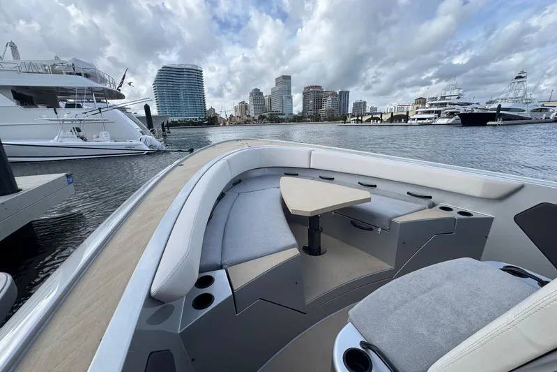 T/t Tenacious Yacht Photos Pics 2025 Wajer 38s luxury yacht interior with city skyline and marina view.