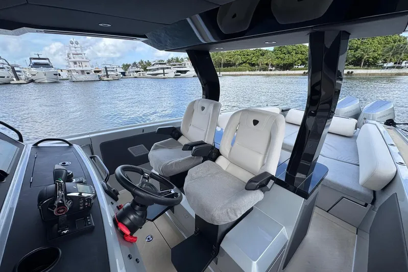 T/t Tenacious Yacht Photos Pics Interior of 2025 Wajer 38s boat with luxurious seating and modern controls.