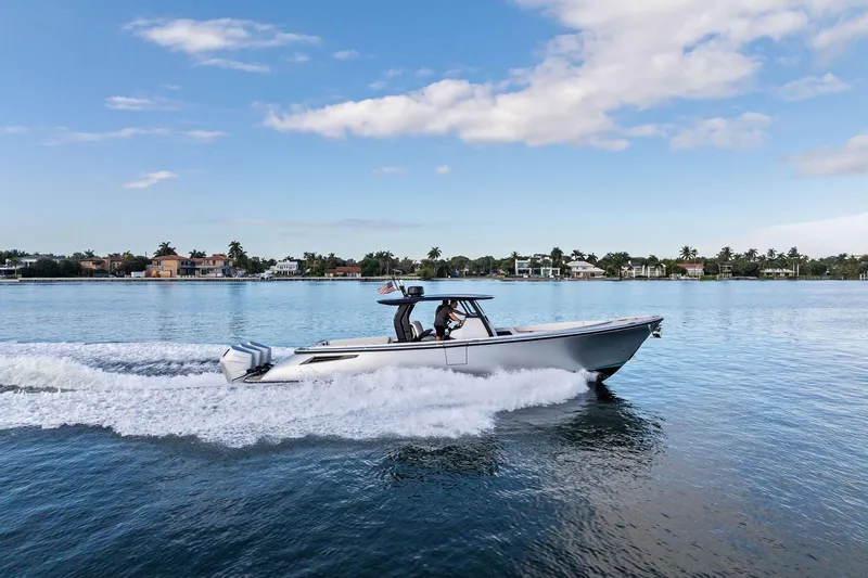 T/t Tenacious Yacht Photos Pics 2025 Wajer 38s boat cruising on calm water under a clear blue sky.