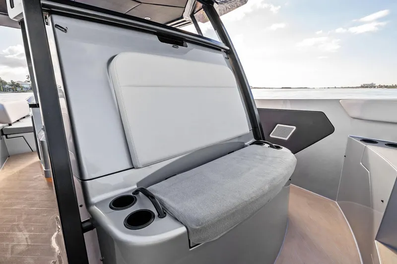 T/t Tenacious Yacht Photos Pics 2025 Wajer 38s boat interior with sleek seating and cup holders.