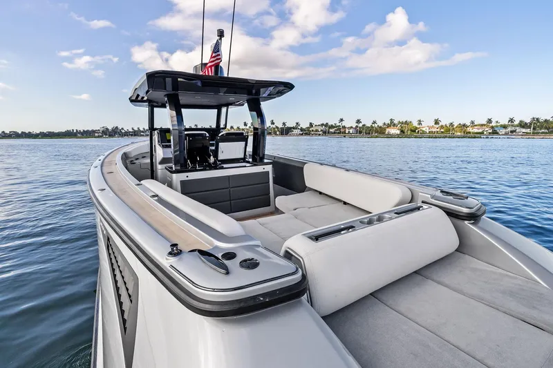 T/t Tenacious Yacht Photos Pics 2025 Wajer 38s luxury yacht on calm water, featuring sleek design and spacious seating.