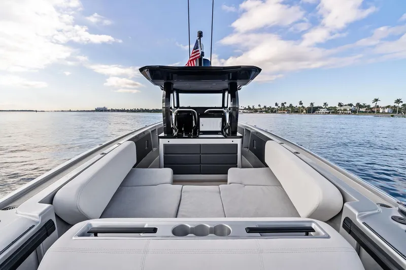 T/t Tenacious Yacht Photos Pics 2025 Wajer 38s luxury yacht interior with spacious seating, ocean view, and American flag.