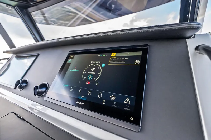 T/t Tenacious Yacht Photos Pics Dashboard of 2025 Wajer 38s yacht featuring a Garmin touchscreen display.