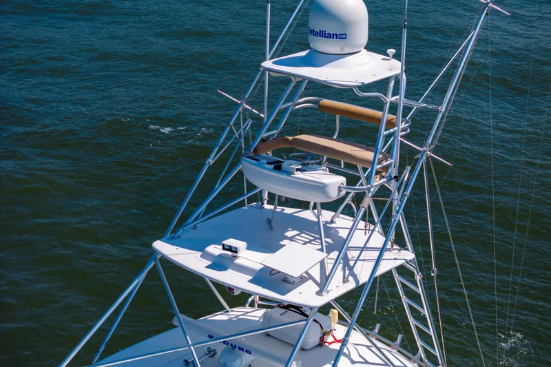 Yacht Photos Pics 2012 Cabo 44 Hardtop Express boat tower on open water.